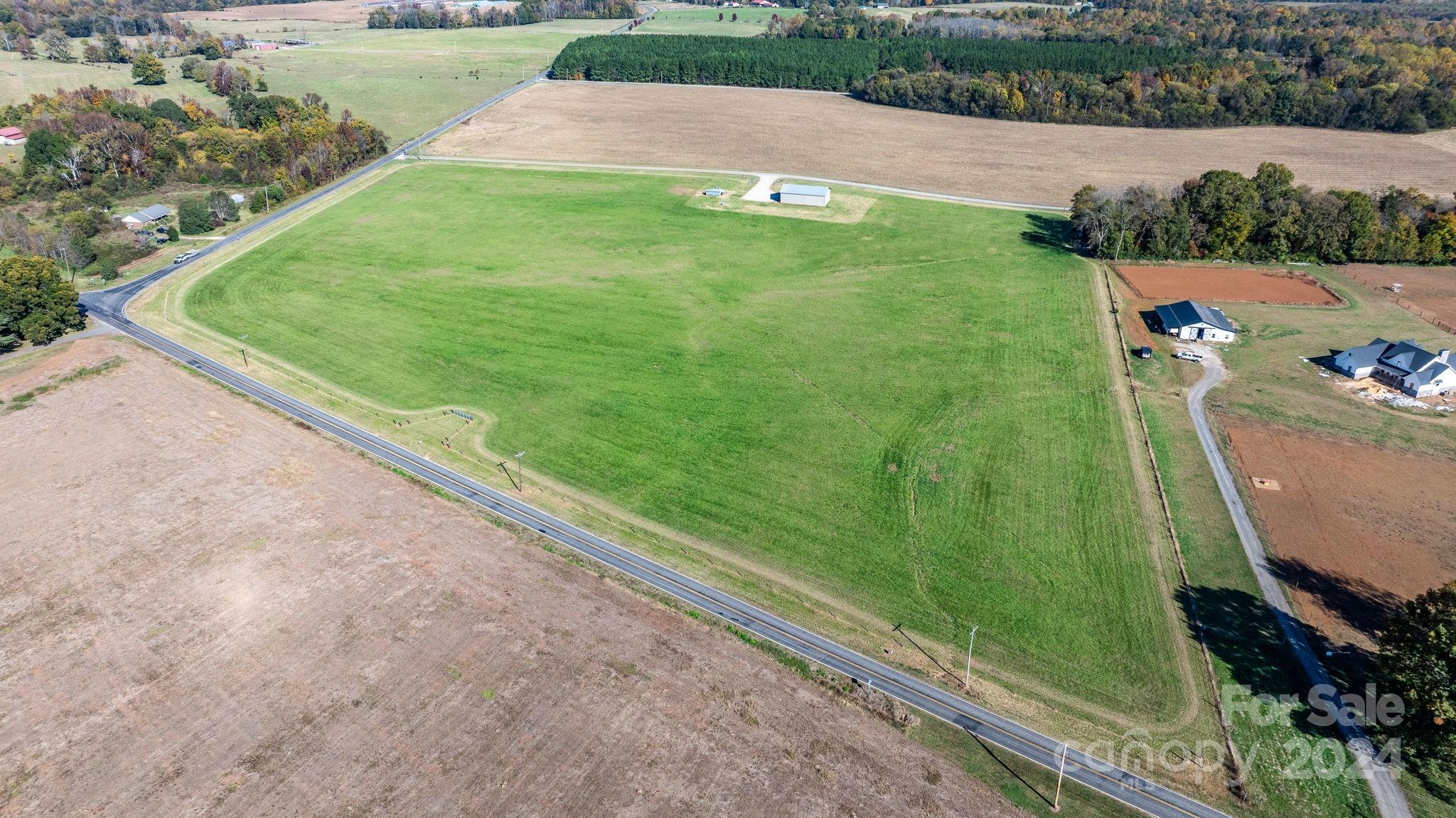 Lot 4 Foster Road Cleveland, NC 27013 - Photo 8 of 22 a view of a yard with potted plants