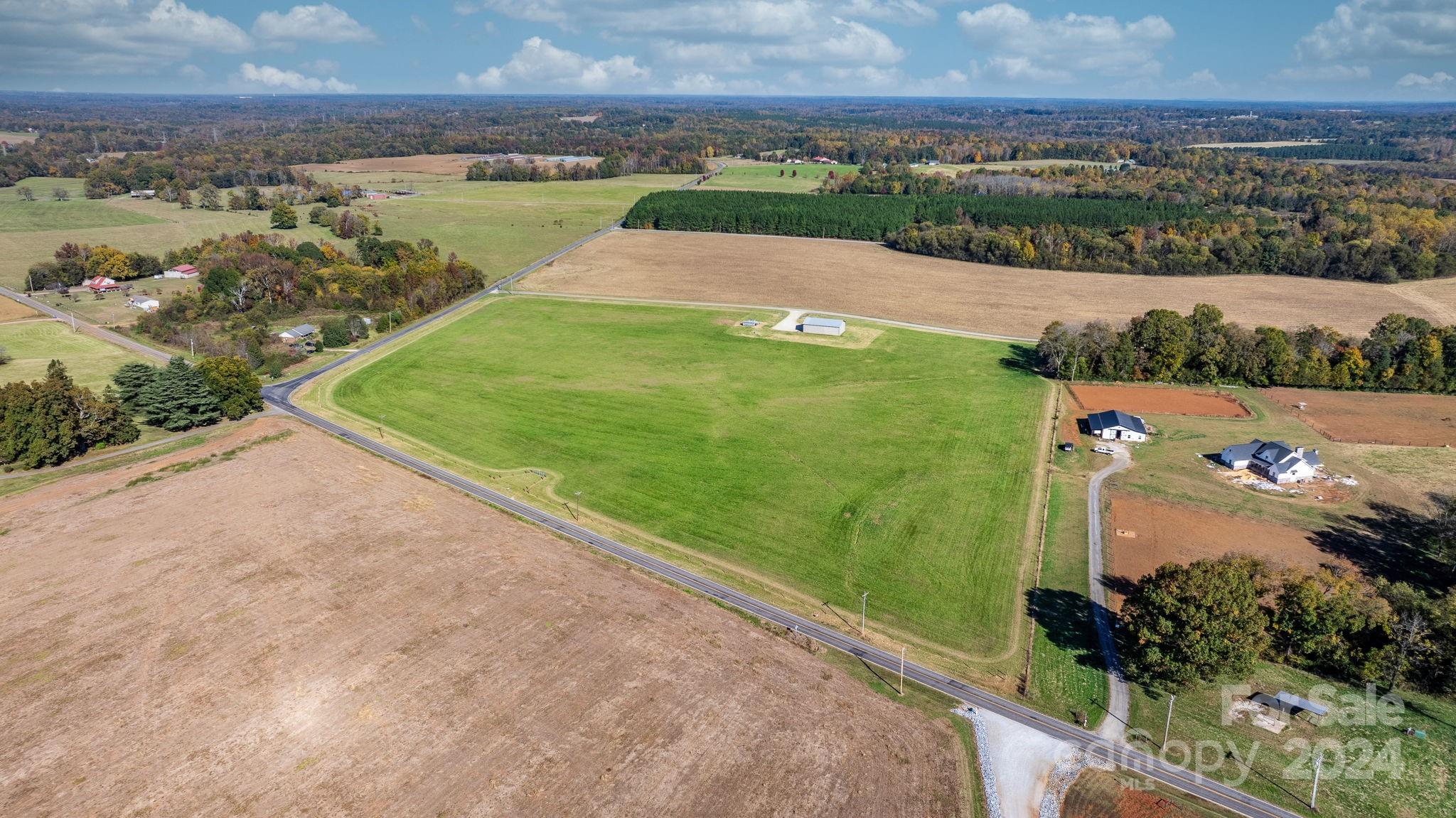 Lot 4 Foster Road Cleveland, NC 27013 - Photo 10 of 22 a view of a city with an ocean