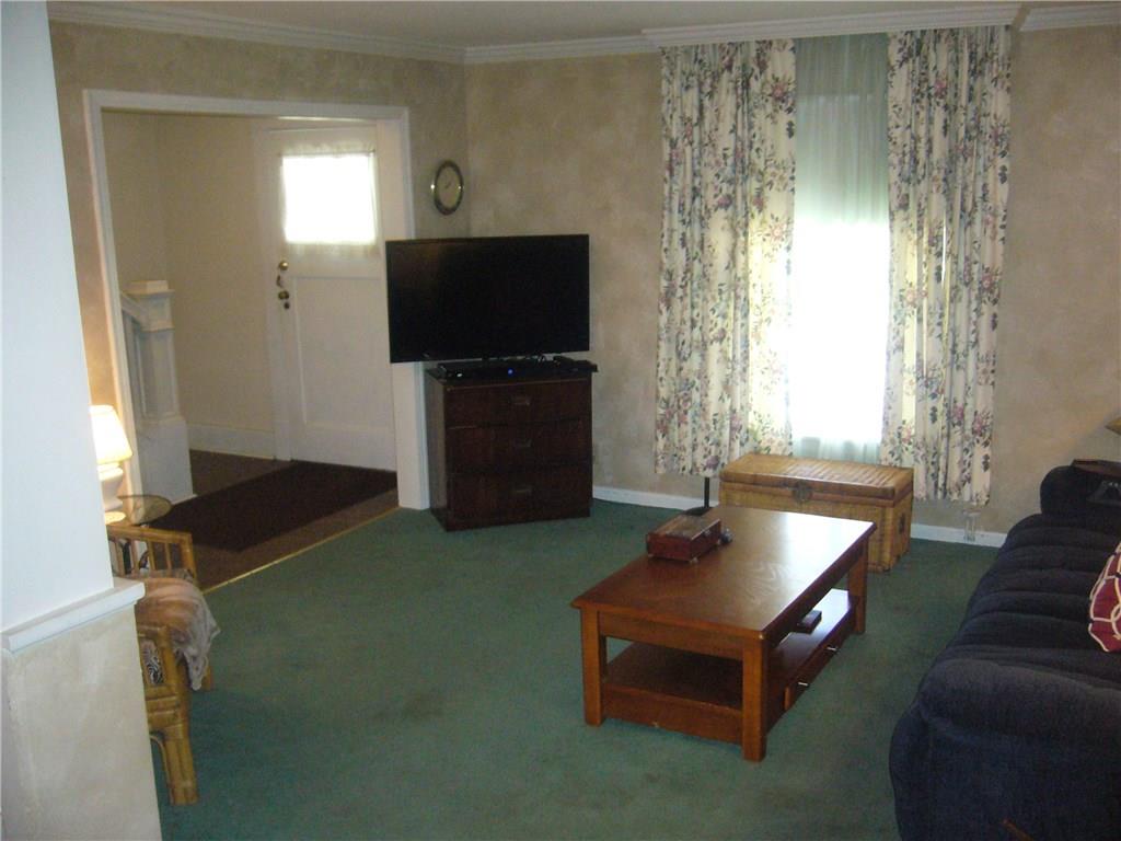 1324 Virginia Avenue Monaca, PA 15061 - Photo 4 of 24 The living room is good size and flows right into the dining room.