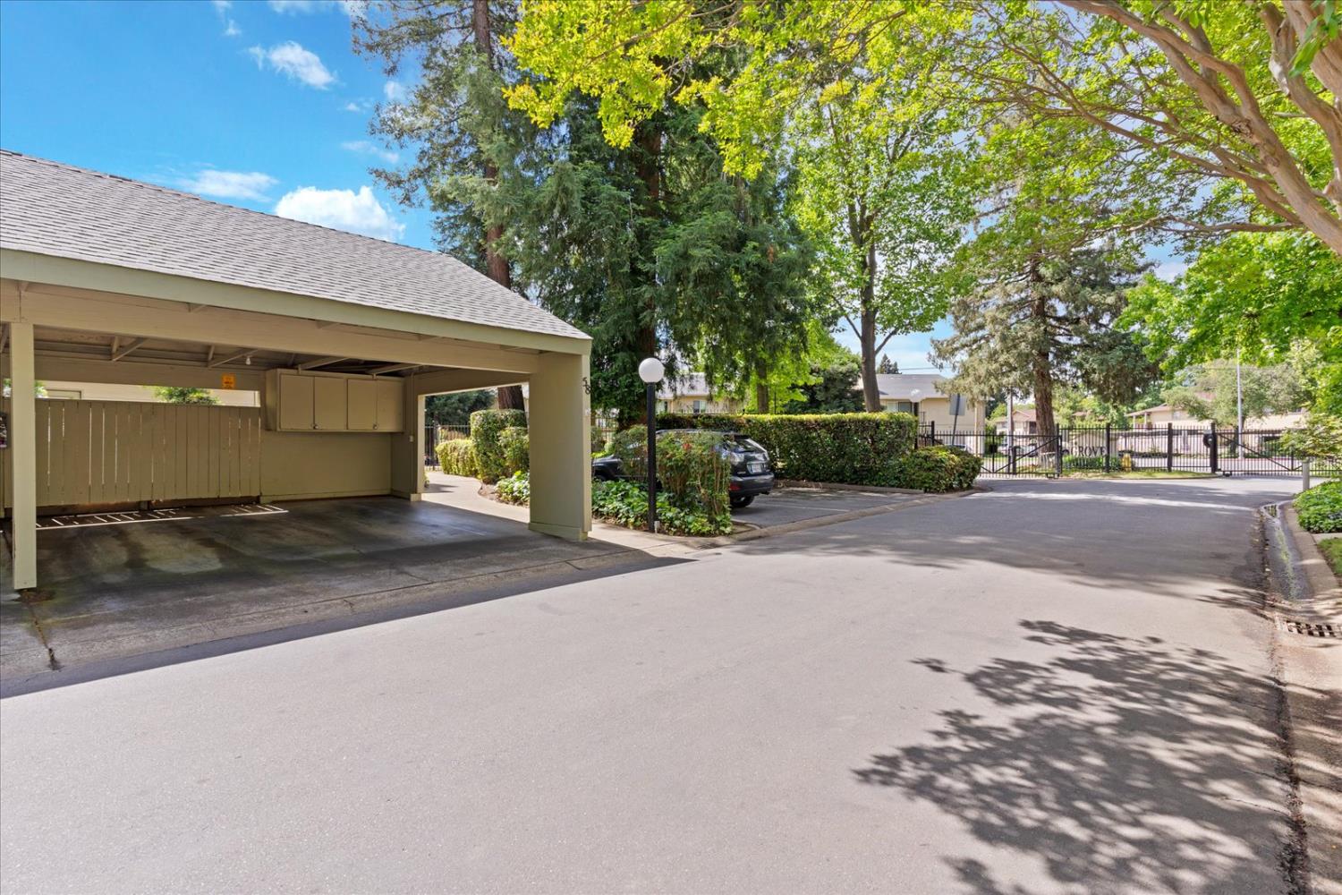 750 Lincoln Road, Unit 58 Yuba City, CA 95991 - Photo 4 of 69 a view of a house with a yard and garage