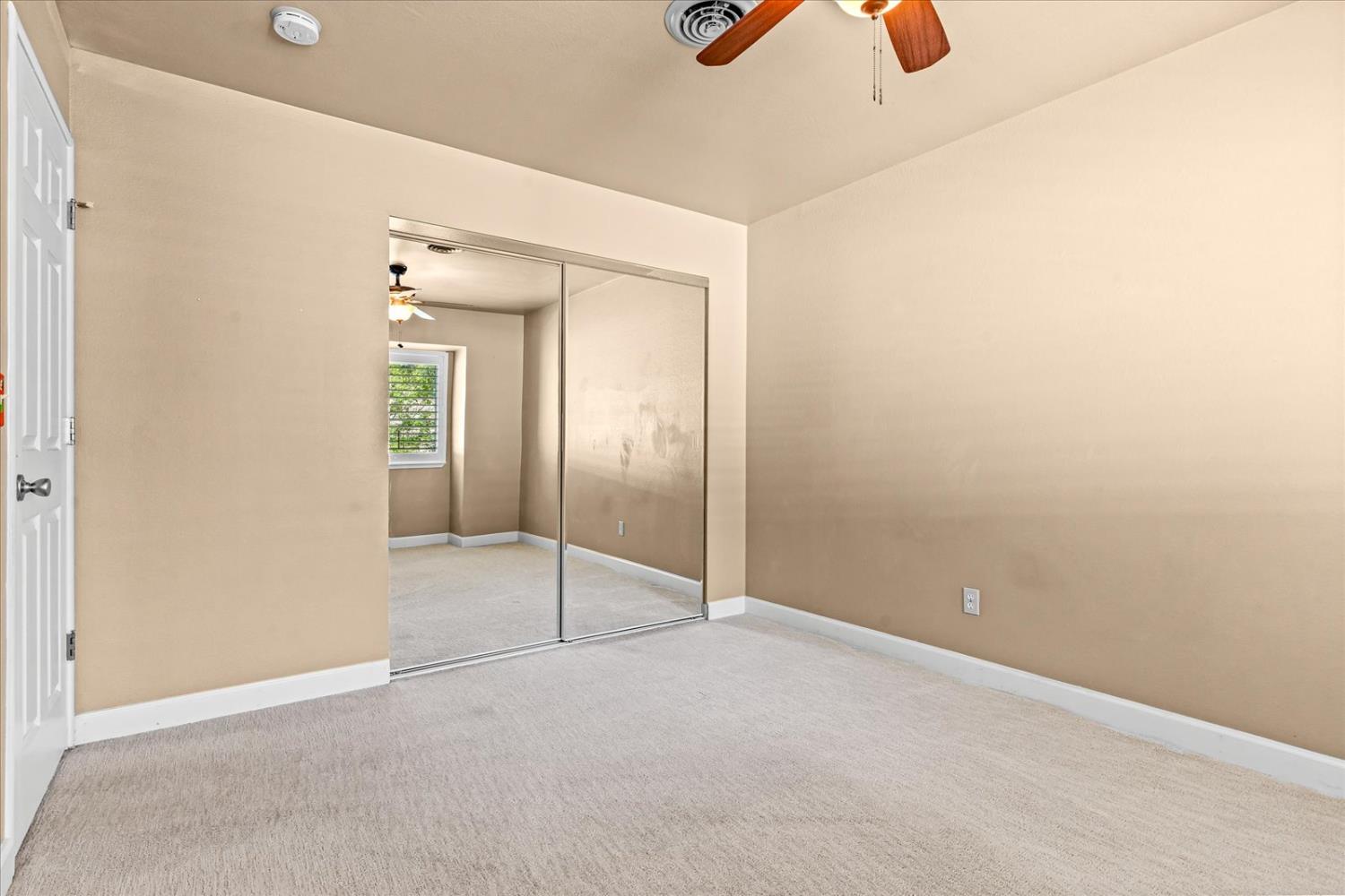 750 Lincoln Road, Unit 58 Yuba City, CA 95991 - Photo 45 of 69 an empty room with fan and glass door