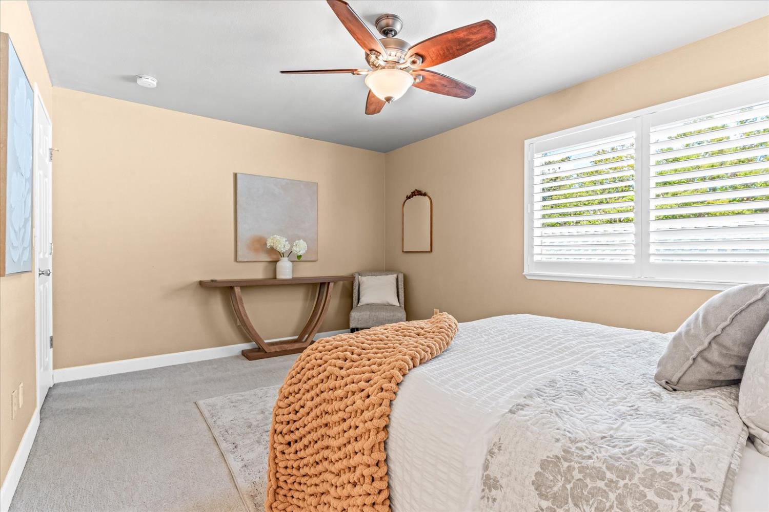 750 Lincoln Road, Unit 58 Yuba City, CA 95991 - Photo 49 of 69 a bedroom with a bed ceiling fan and a window