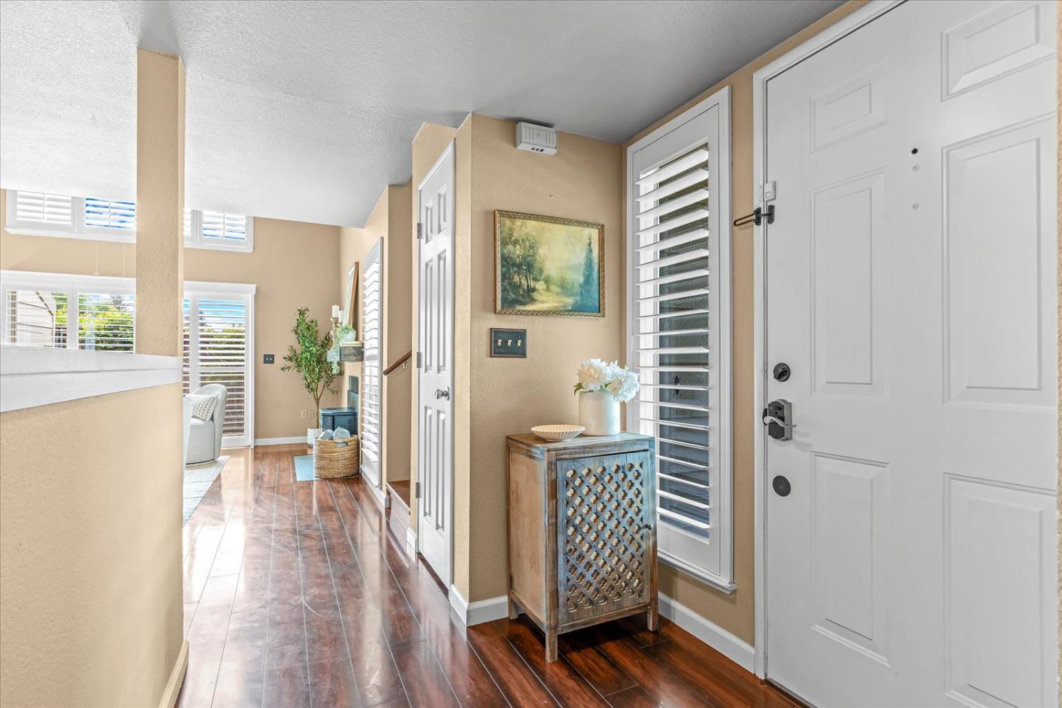 750 Lincoln Road, Unit 58 Yuba City, CA 95991 - Photo 10 of 69 a view of a hallway with wooden floor and windows
