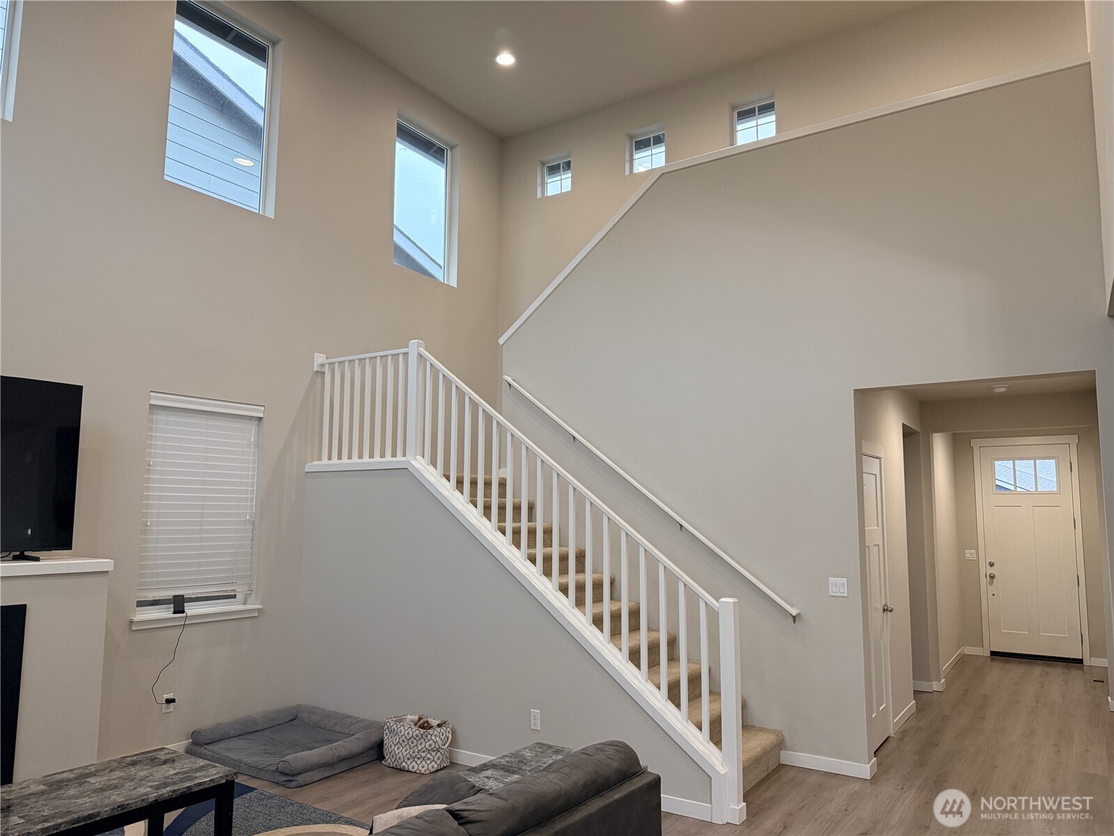 4880 Limerick Drive Southwest Port Orchard, WA 98367 - Photo 20 of 38 a view of entryway and hall with wooden floor