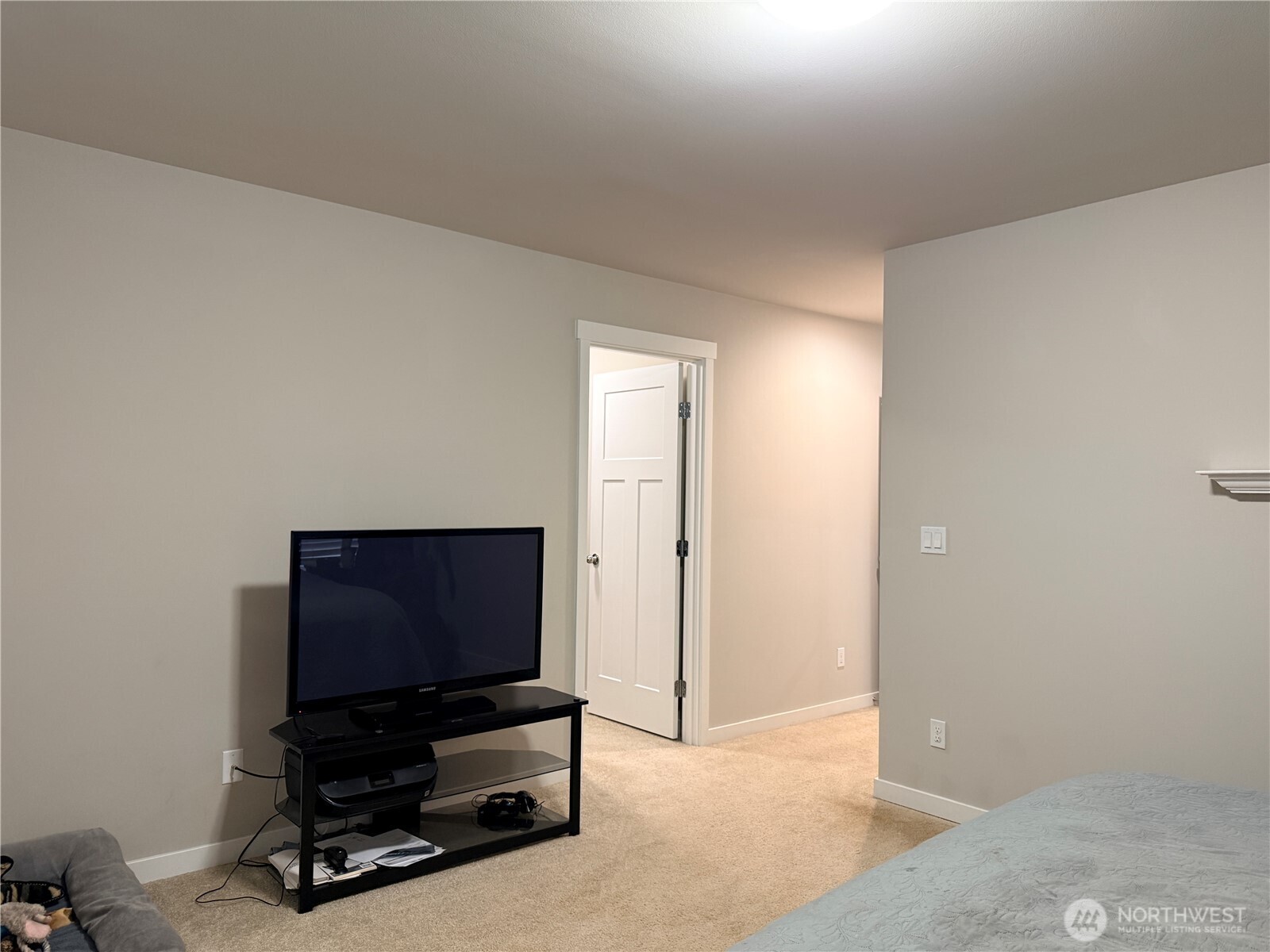4880 Limerick Drive Southwest Port Orchard, WA 98367 - Photo 23 of 38 a living room with television and a flat screen tv
