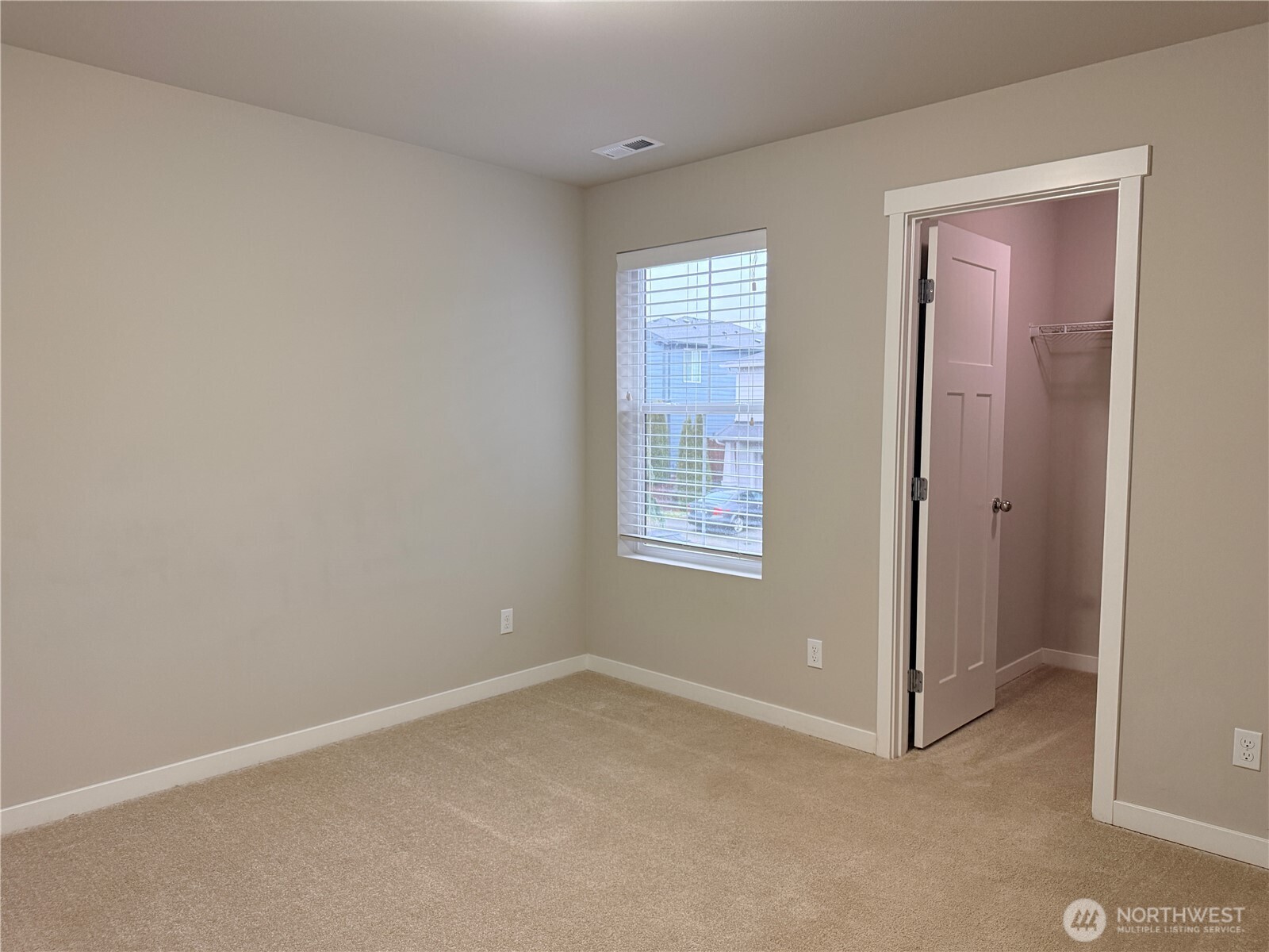 4880 Limerick Drive Southwest Port Orchard, WA 98367 - Photo 29 of 38 an empty room with windows and closet