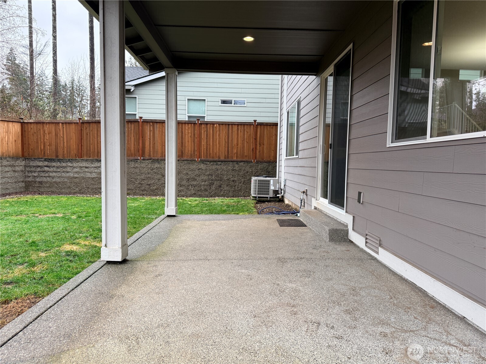 4880 Limerick Drive Southwest Port Orchard, WA 98367 - Photo 37 of 38 a view of a porch with wooden floor and fence