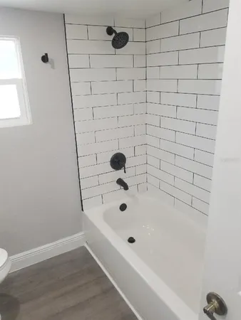 a bathroom with a bathtub