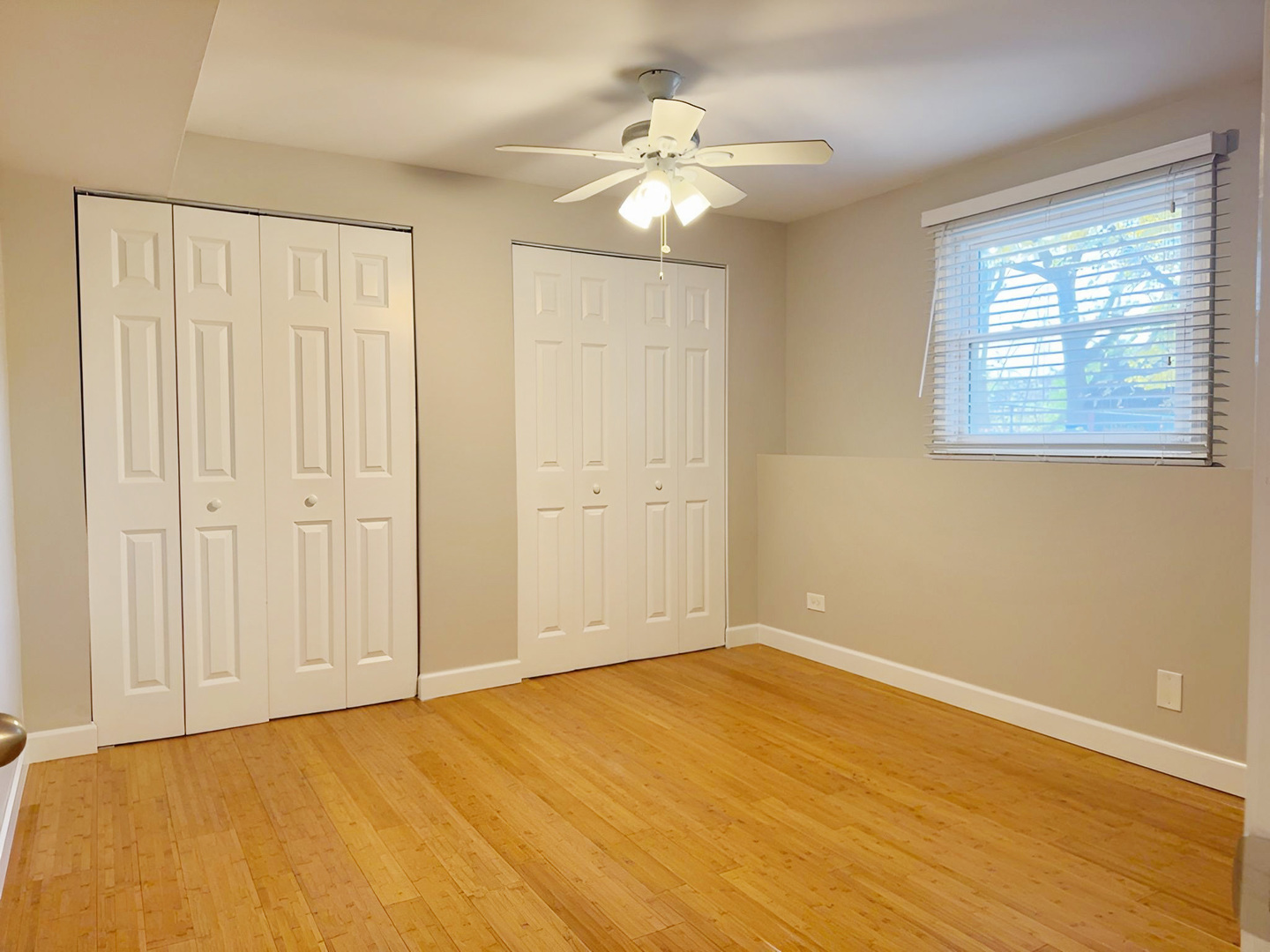 533 Surryse Road Lake Zurich, IL 60047 - Photo 35 of 51 a view of an empty room with wooden floor