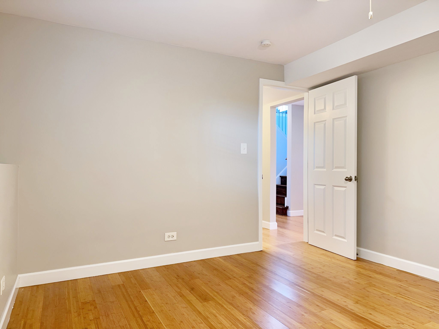 533 Surryse Road Lake Zurich, IL 60047 - Photo 36 of 51 a view of an empty room with wooden floor