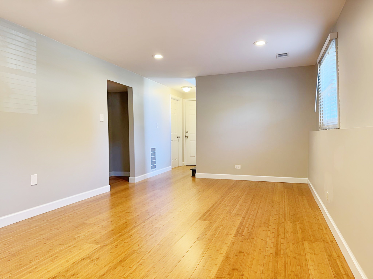533 Surryse Road Lake Zurich, IL 60047 - Photo 42 of 51 a view of an empty room with wooden floor