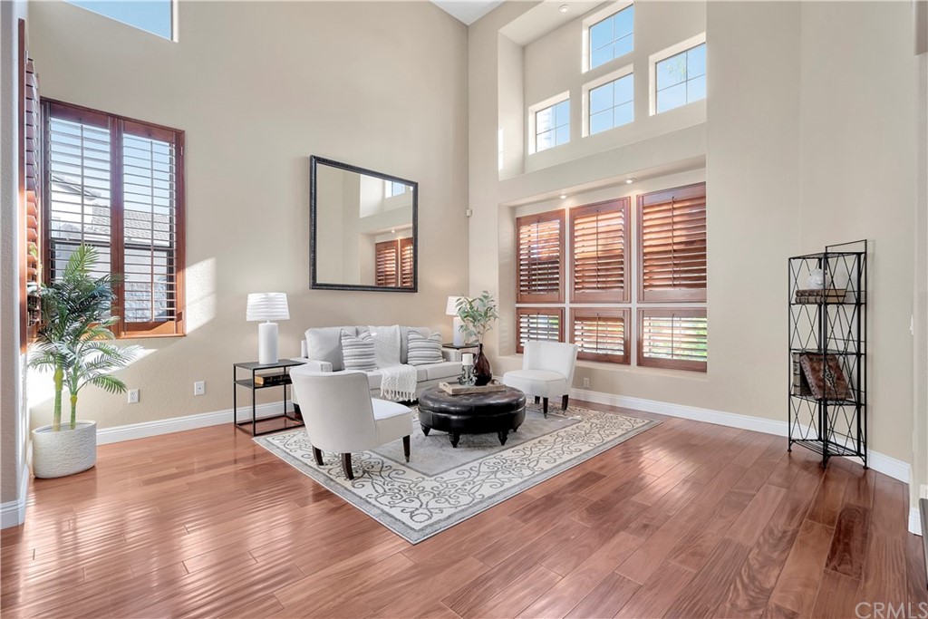 1600 Canyon Crest Circle Corona, CA 92882 - Photo 13 of 74 a living room with fireplace furniture and a wooden floor