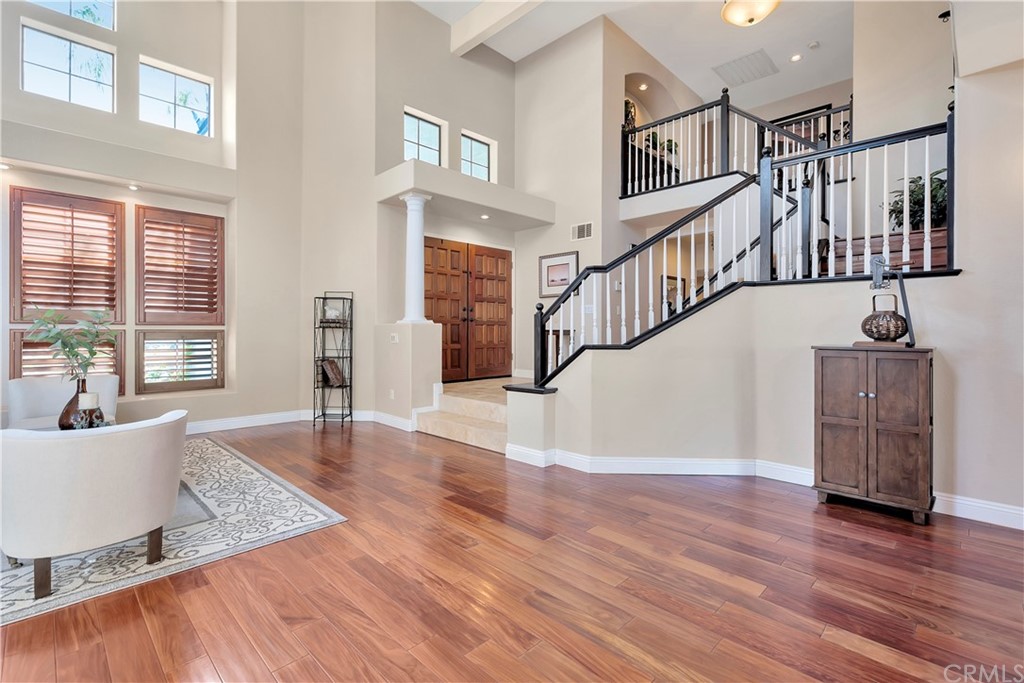 1600 Canyon Crest Circle Corona, CA 92882 - Photo 17 of 74 a view of entryway livingroom and hall with wooden floor