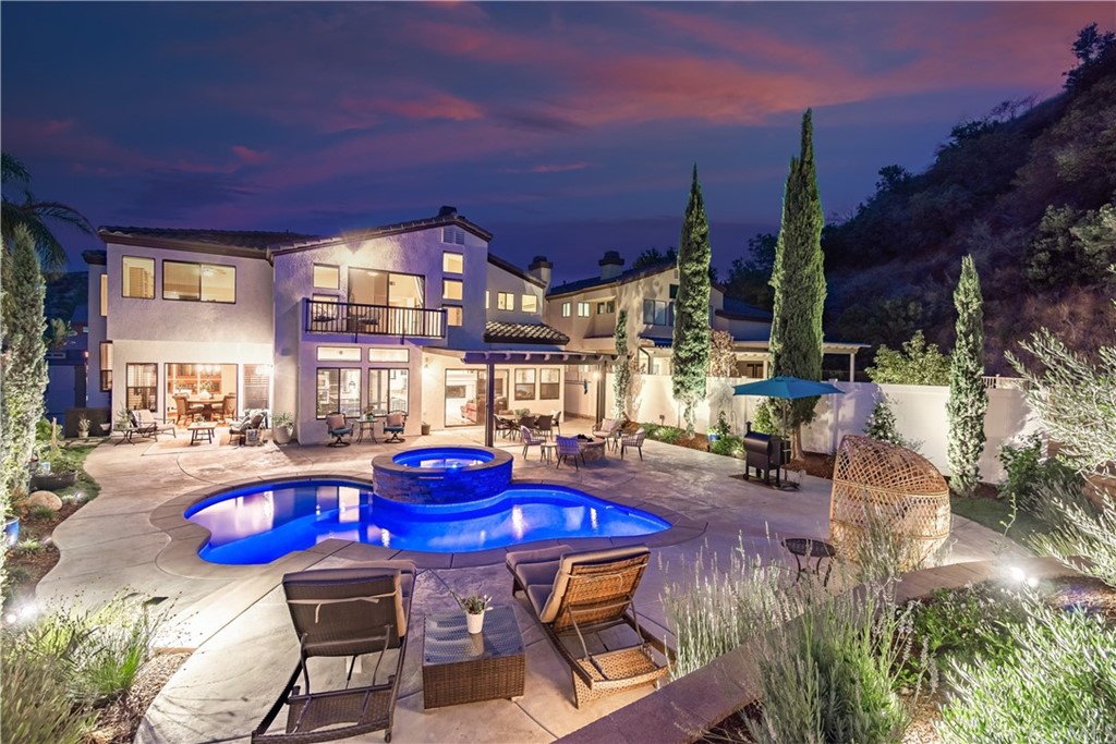 1600 Canyon Crest Circle Corona, CA 92882 - Photo 3 of 74 a view of a dining room with furniture and chandelier