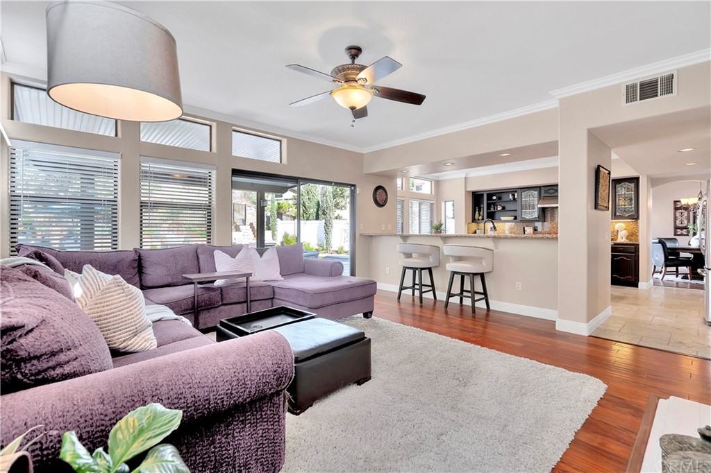 1600 Canyon Crest Circle Corona, CA 92882 - Photo 23 of 74 a living room with furniture and a large window