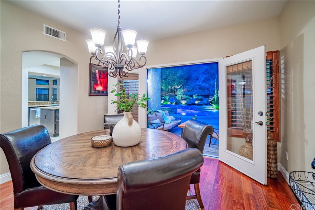 1600 Canyon Crest Circle Corona, CA 92882 - Photo 70 of 74 a dining room with furniture and window