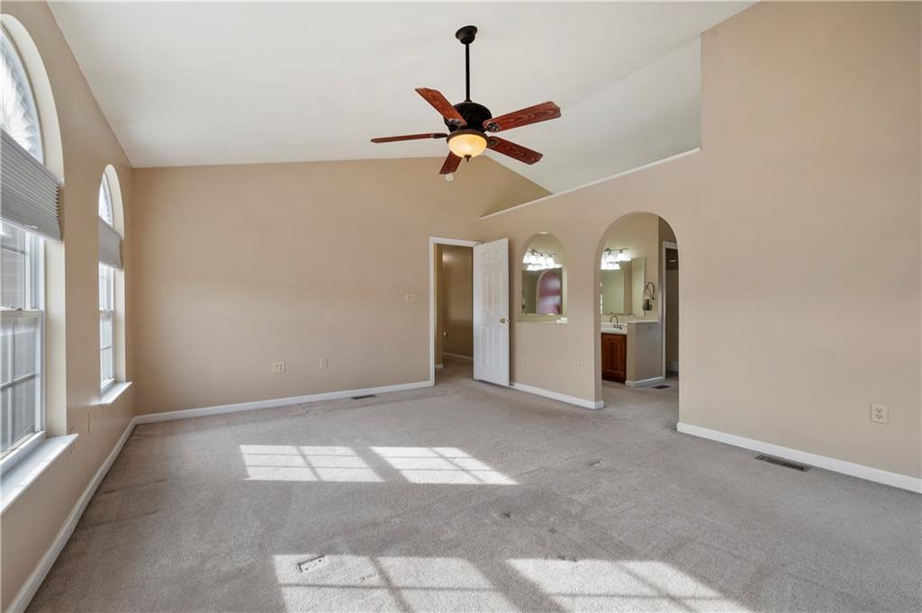 208 Commodore Drive McDonald, PA 15057 - Photo 17 of 36 a view of a livingroom with a ceiling fan and window