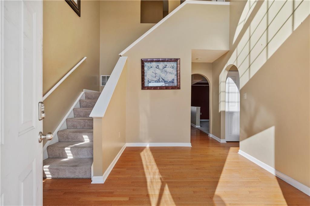 208 Commodore Drive McDonald, PA 15057 - Photo 2 of 36 a view of entryway and hall with wooden floor