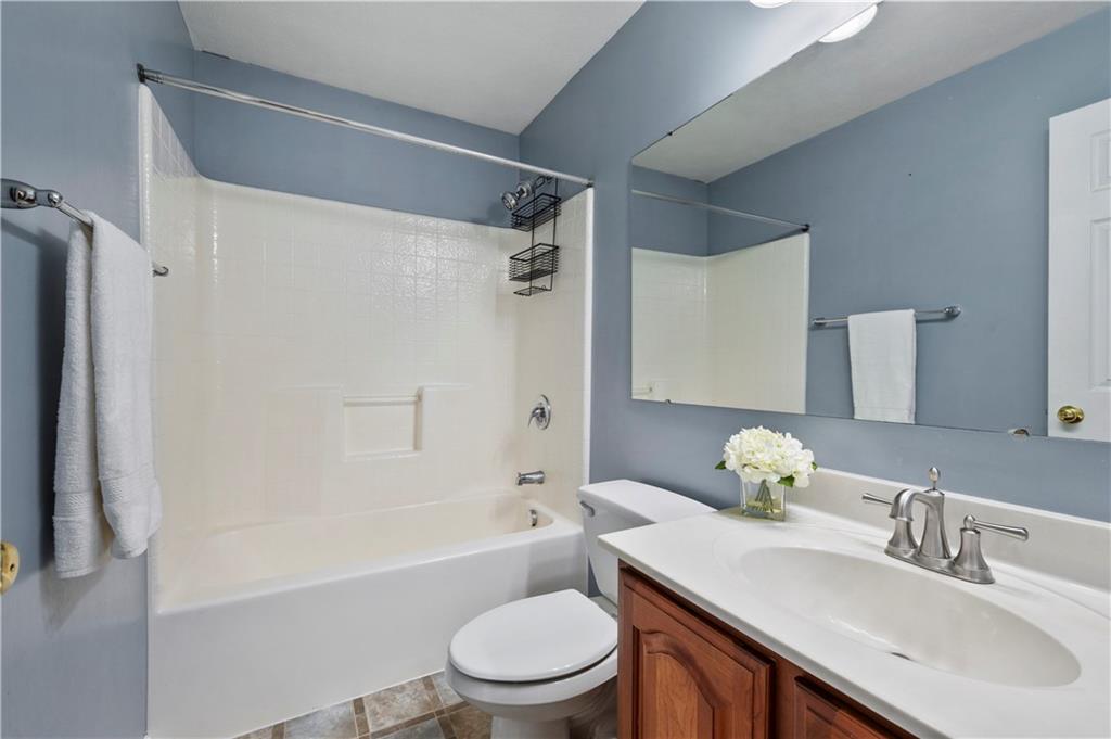 208 Commodore Drive McDonald, PA 15057 - Photo 22 of 36 a bathroom with a sink toilet tub vanity and shower