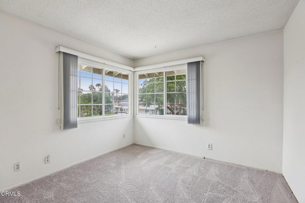 10856 Topeka Drive Porter Ranch, CA 91326 - Photo 28 of 40 an empty room with windows
