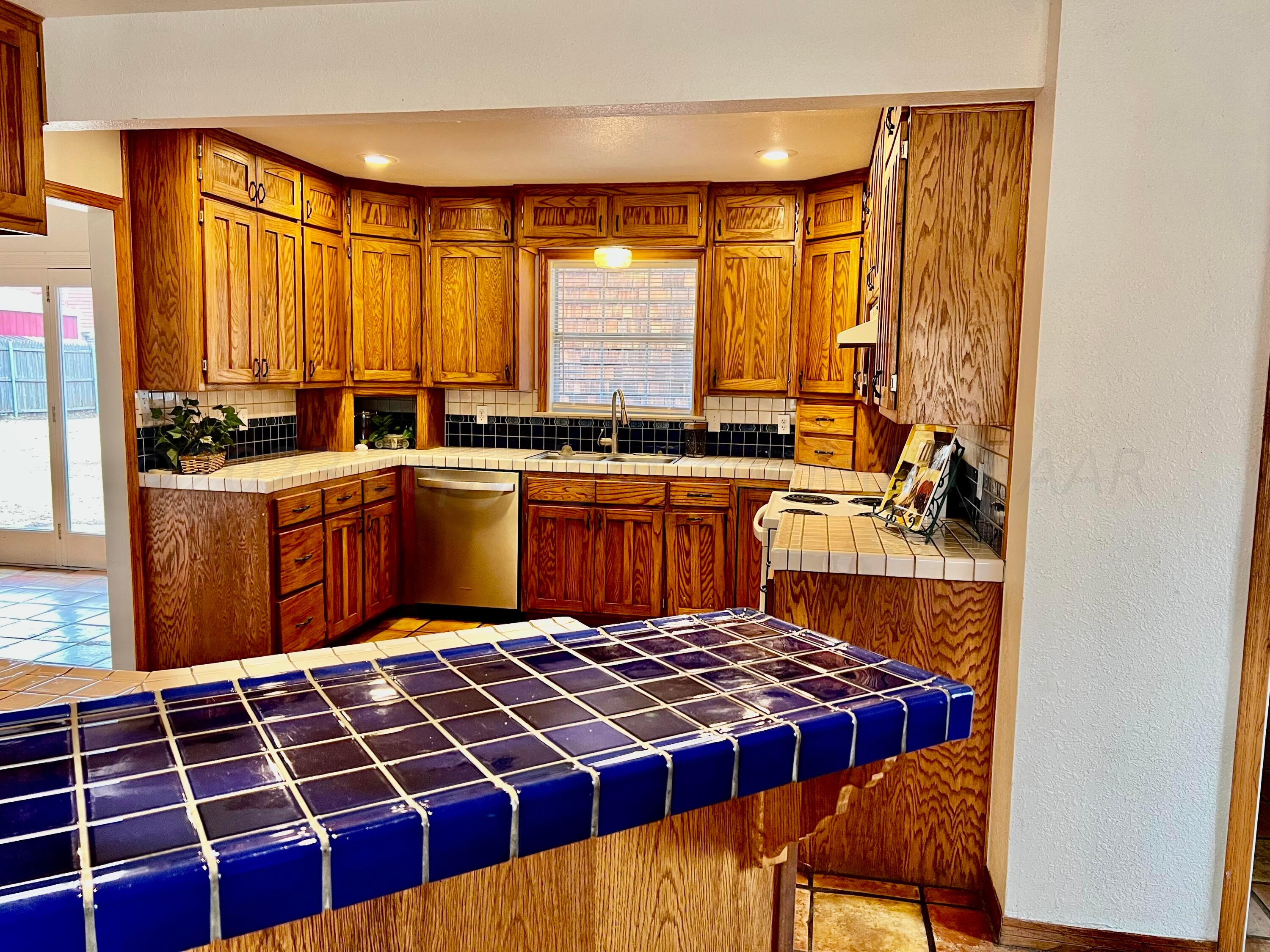 4600 Southwest 38th Avenue Amarillo, TX 79109 - Photo 2 of 19 a large kitchen with a large window