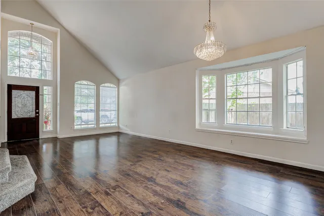 a view of entryway with wooden floor