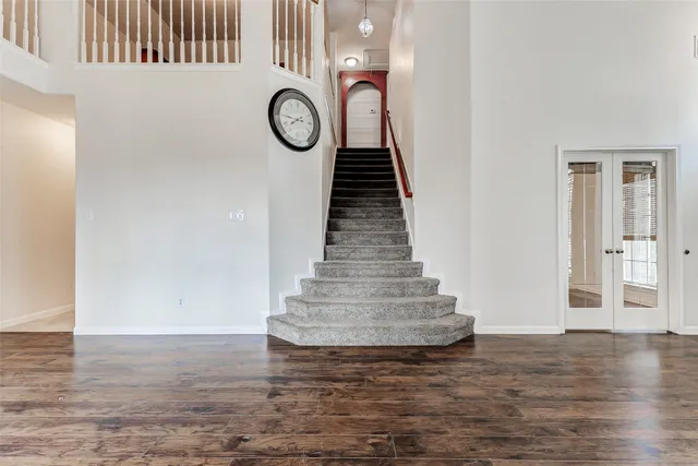 a view of entryway with wooden floor