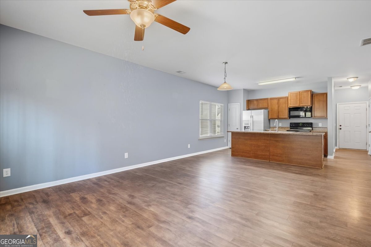 15 Grandberry Court Southwest Rome, GA 30165 - Photo 8 of 23 a view of kitchen with wooden floor