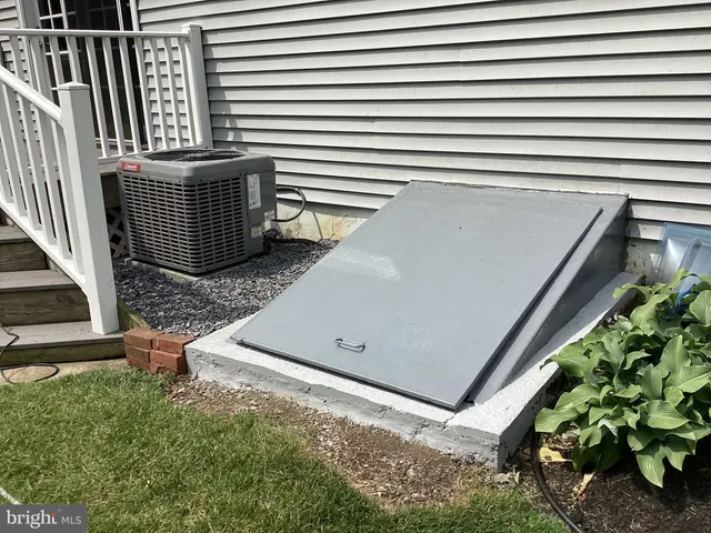a view of a backyard with chairs