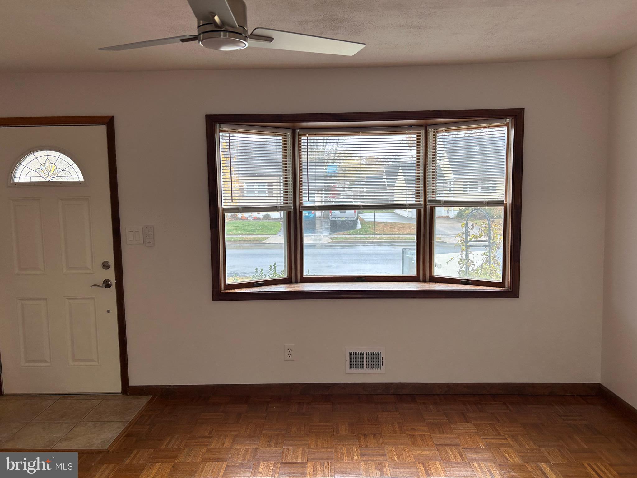 69 Wickom Avenue Hamilton, NJ 08690 - Photo 8 of 14 a view of a room that has a large window