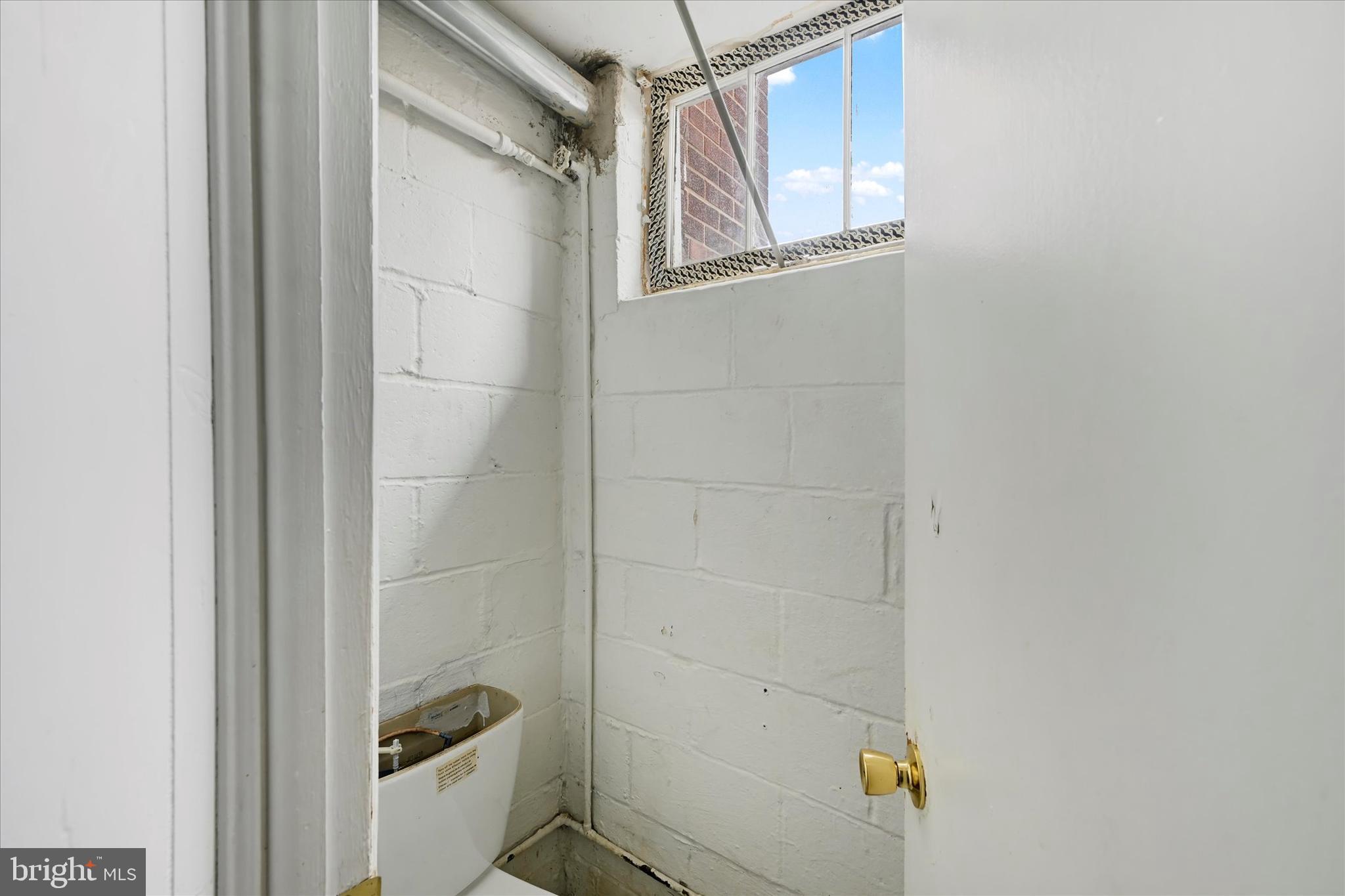 8059 Gray Haven Road Dundalk, MD 21222 - Photo 16 of 19 a bathroom with a shower