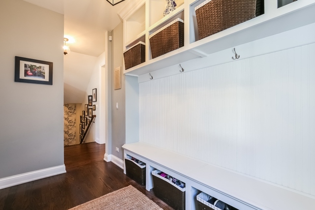 636 Northmoor Road Lake Forest, IL 60045 - Photo 14 of 40 a view of a hallway with wooden floor and entryway