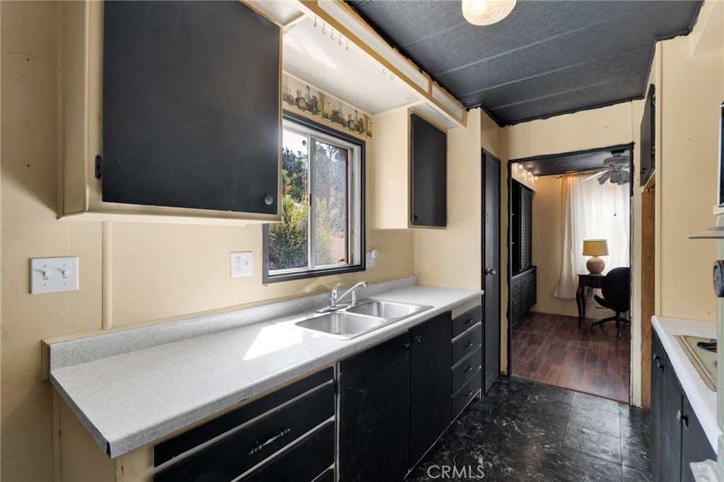 7635 Desert Front Road Wrightwood, CA 92397 - Photo 33 of 60 a en suite bathroom with a sink and a mirror