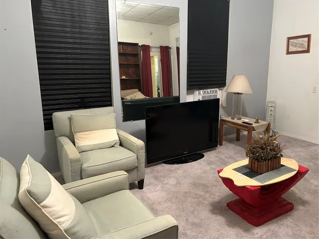 a bathroom with a toilet and a sink