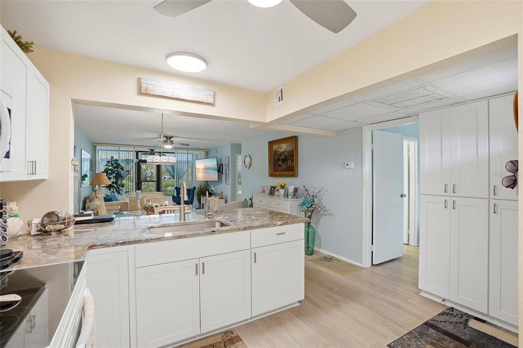 12300 Vonn Road, Unit 7104 Largo, FL 33774 - Photo 8 of 41 a bathroom with a double vanity sink mirror and shower