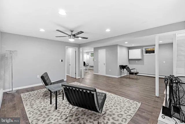 a bed room with a bed and a television