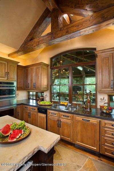 770 Pioneer Springs Ranch Road Aspen, CO 81611 - Photo 13 of 46 a kitchen with a sink and cabinets