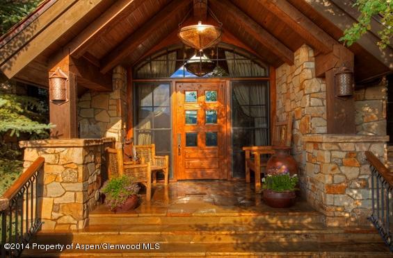 770 Pioneer Springs Ranch Road Aspen, CO 81611 - Photo 33 of 46 a view of a patio with glass door