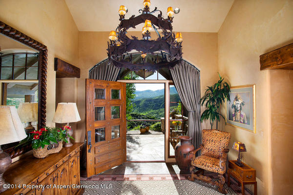 770 Pioneer Springs Ranch Road Aspen, CO 81611 - Photo 34 of 46 a building outdoor space with patio furniture