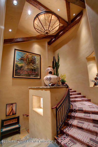 770 Pioneer Springs Ranch Road Aspen, CO 81611 - Photo 39 of 46 a bedroom with furniture and window