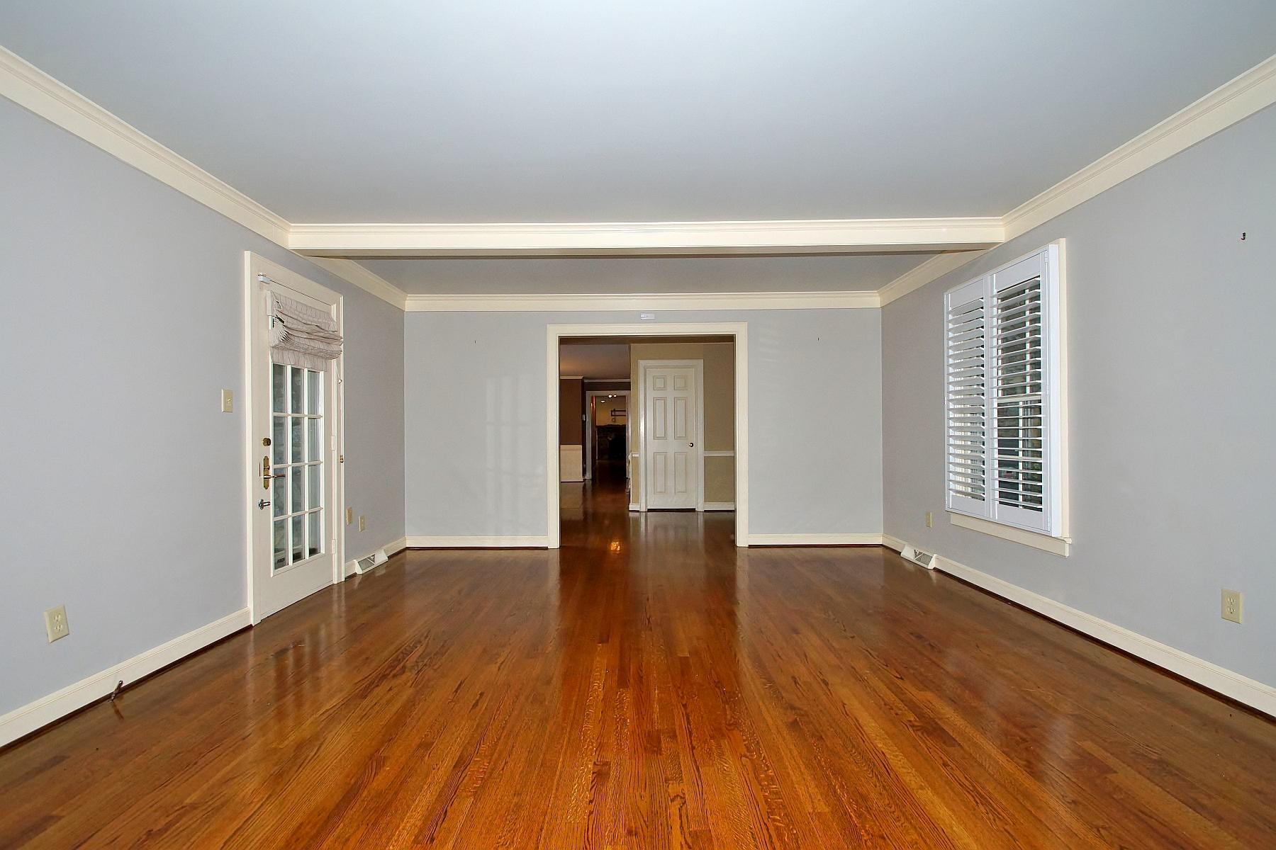 3407 West Ridge Circle Southwest Roanoke, VA 24014 - Photo 22 of 85 a view of an empty room with wooden floor and a window