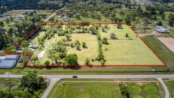 a view of a swimming pool with an outdoor space
