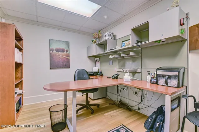 an aerial view of a house with yard swimming pool and outdoor seating