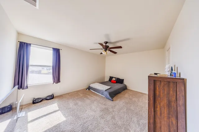 a view of a room with toys and a window
