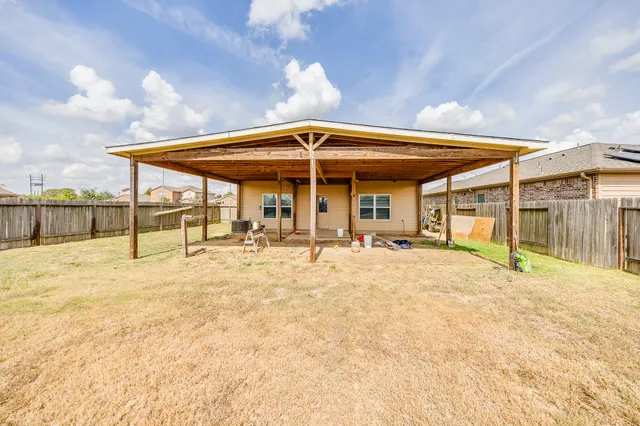 a house view with a garden space