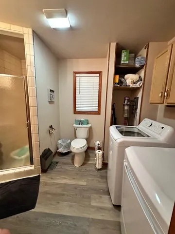 a view of a bathroom with a sink and a mirror