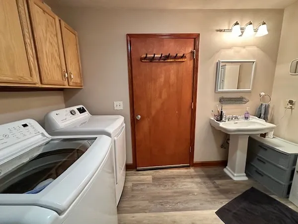 a utility room with dryer and washer