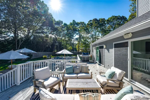 a view of a patio on the roof deck