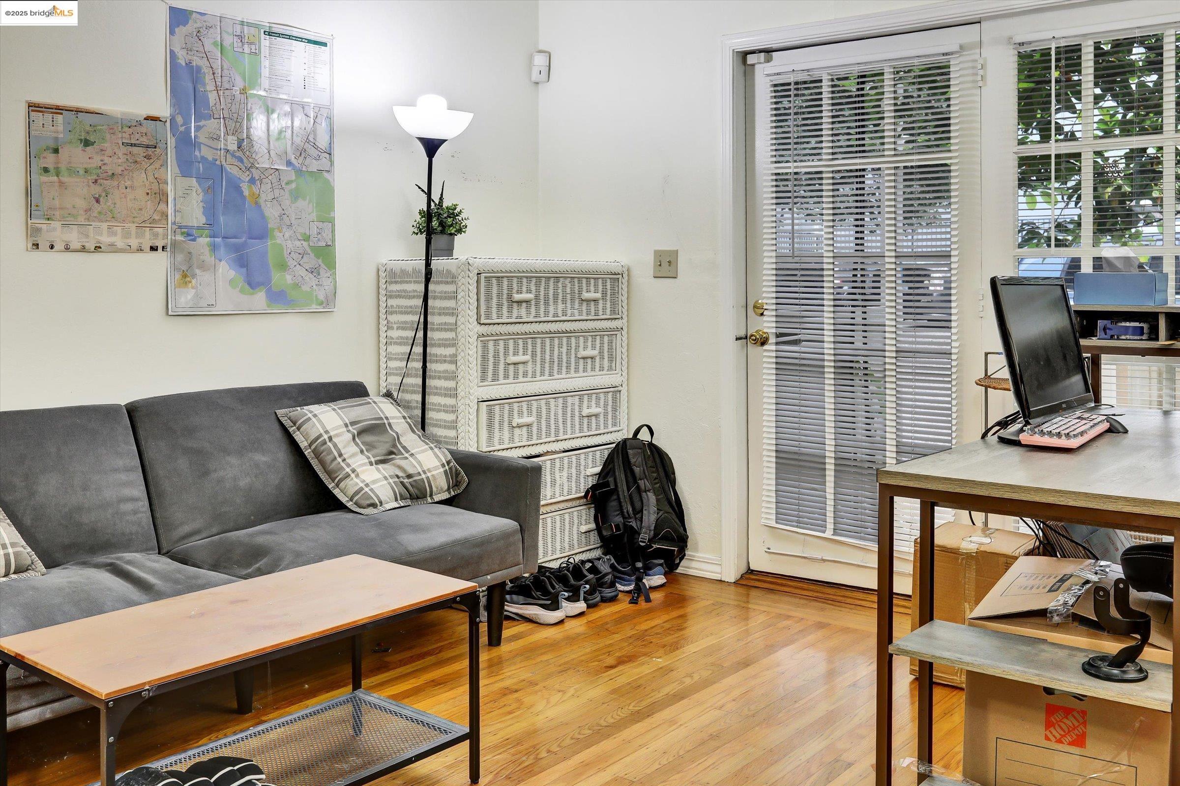 2117 Delaware Street, Unit B Berkeley, CA 94709 - Photo 2 of 14 a living room with furniture a rug and a window
