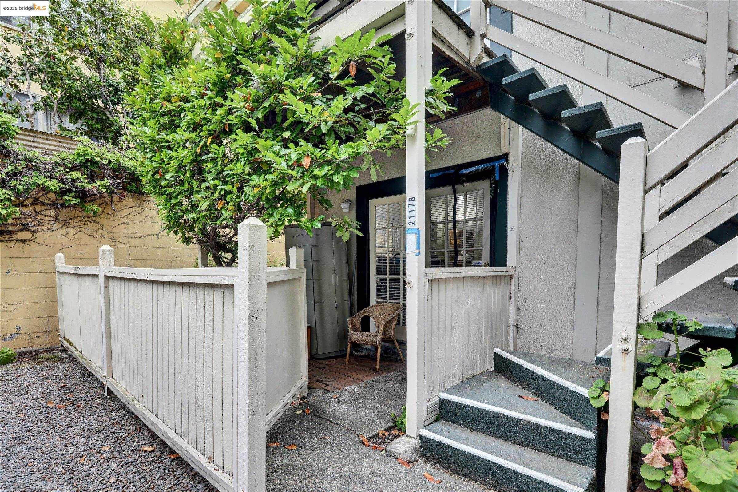 2117 Delaware Street, Unit B Berkeley, CA 94709 - Photo 10 of 14 a house view with a backyard